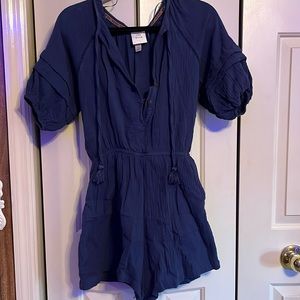 Dark blue Knox Rose Jumper. Has built in shorts and adjustable neckline.